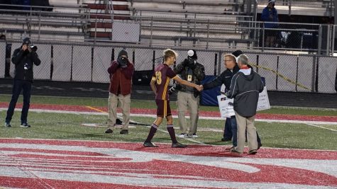 Chesterton Senior Captain Nick Biel is congratulated by the ISHAA for winning the Mental Attitude Award.