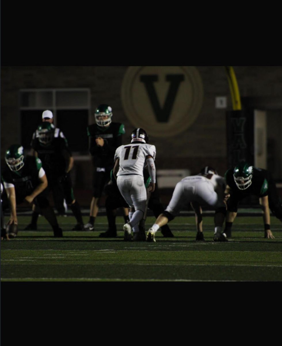 Junior linebacker Robert Stabolito gets set to rush into the Valparaiso backfield.