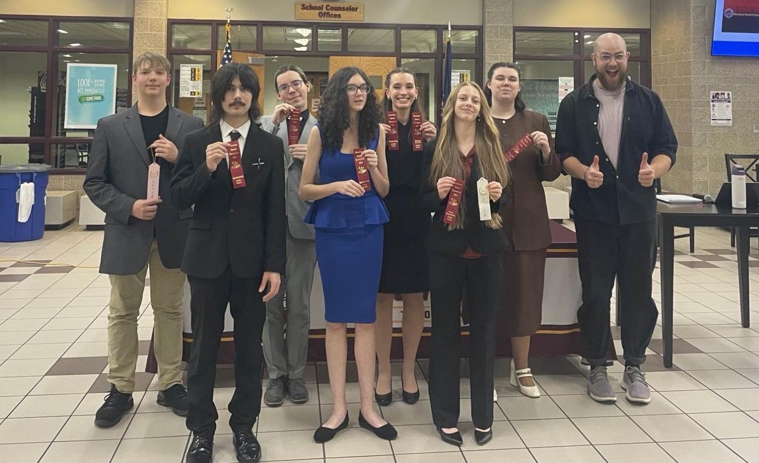 top (left to right): Hunter Yankauskas, Dex Trzaska, Carmen Thomas, Maddi Morton, Aaron Drew. 

bottom (left to right): Damion Lopez, Via Wheeler, Luci Thompson. 

not pictured: Annebell Haas