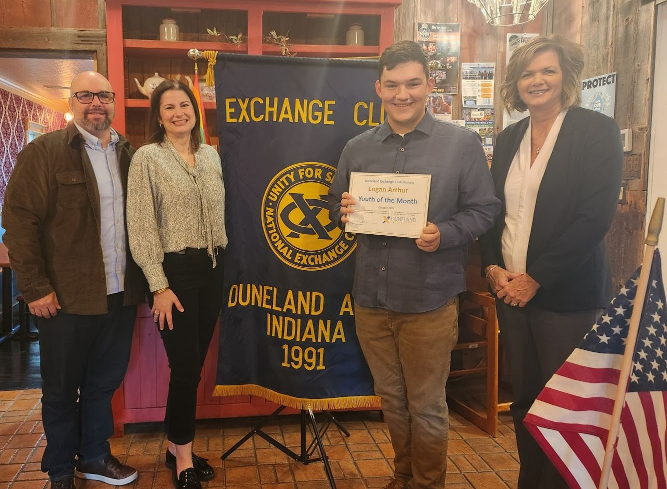 Above pictured (left to right) are Greg and Gretchen Arthur, Logan Arthur's parents; Logan Arthur, recipient of the award; and Jackie Ruge-Perkins, Exchange Club Treasurer.
Provided by Believe and Achieve Times