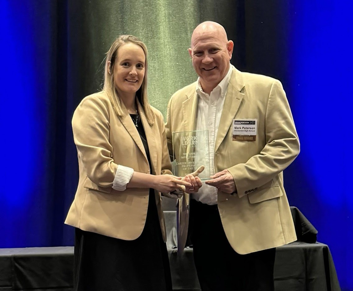 Mark Peterson receives his award during the luncheon.