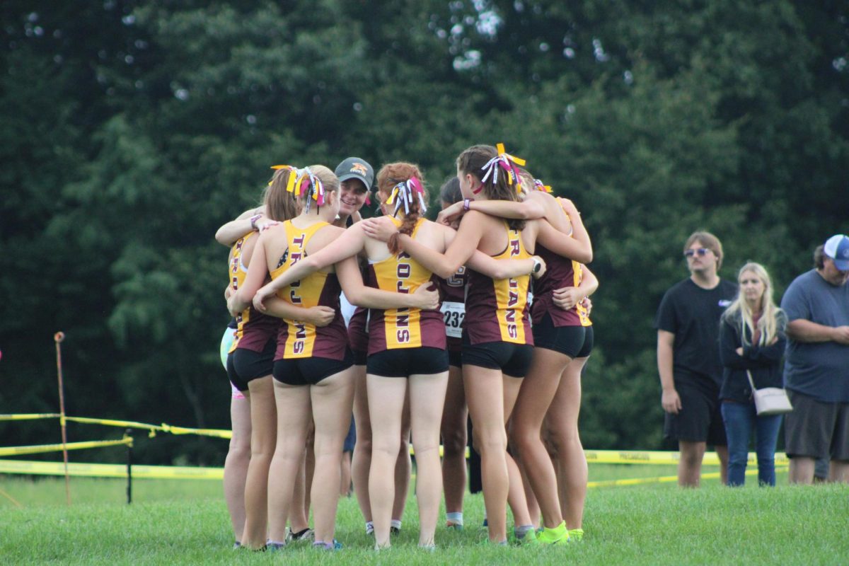 The Girls' XC team at the Larry James Invitational
